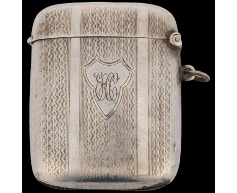 A George V curved silver Vesta case, Joseph Gloster Ltd, Birmingham 1925, rectangular form with allover engine turned decorat