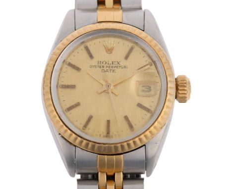 ROLEX - a lady's bi-metal Oyster Perpetual Date automatic calendar bracelet watch, ref. 69173, circa 1981, brushed champagne 