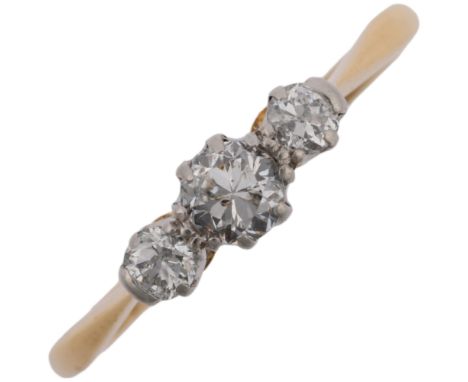A mid-20th century 18ct gold three stone diamond ring, platinum-topped, set with round-cut diamonds, total diamond content ap