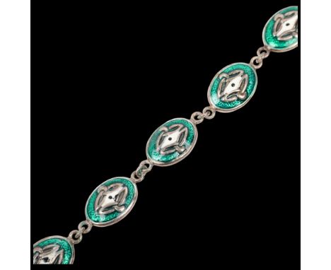 A modern sterling silver and enamel Celtic panel bracelet, 19cm, 14.7g Condition Report: Several small enamel chips and some 