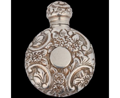 A Victorian silver moon scent flask, Saunders &amp; Shepherd, Chester 1890, allover relief embossed floral decoration, 6.5cm,