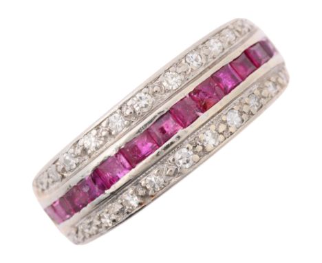 An Art Deco ruby and diamond triple row half eternity ring, circa 1925, channel and pave set with calibre-cut rubies and eigh