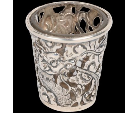 A Chinese export silver 'Dragon' drinking tot, circa 1900, signed with Artisan mark, retailed by Wang Hing, with glass liner,