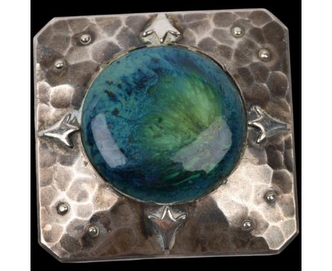 An Arts and Crafts hand wrought pewter and Ruskin style ceramic Plantagenet panel brooch, circa 1910, 45.4mm, 29.4g Condition