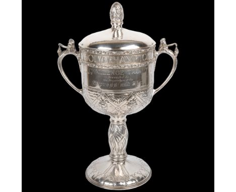 An impressive and unique Arts and Crafts George V silver 2-handled presentation trophy cup and cover, Albert Edward Jones, Bi