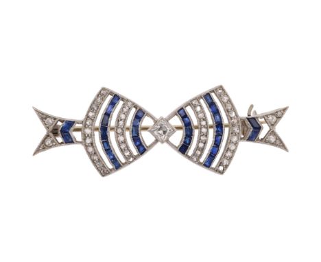 An Art Deco French sapphire and diamond openwork bow tie brooch, circa 1920, set with square and rose-cut diamonds with calib