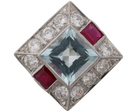 An Art Deco style platinum aquamarine ruby and diamond square panel ring, set with square-cut rubies and modern round brillia