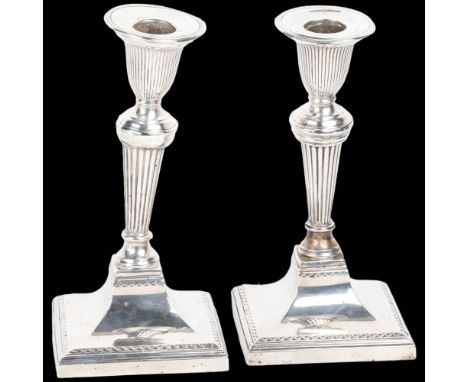 A pair of late Victorian silver table candlesticks, Richard Hodd &amp; Son, London 1896, in the Sheritan style, with removeab