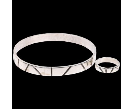 DEN-PERMANENTE - a Danish modernist sterling silver handicraft matching slave bangle and band ring, possibly designed by Kay 