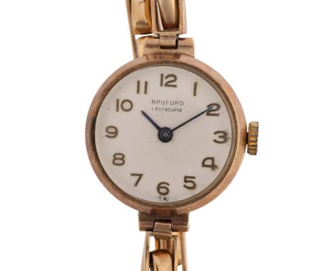 A lady's 9ct gold mechanical wristwatch, by Bruford of Eastbourne, ref. 77812, circa 1960s, silvered dial with gilt Arabic nu