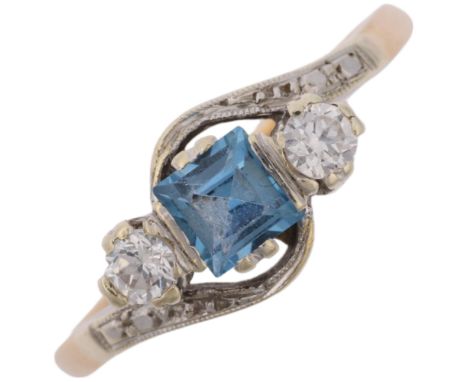 An Art Deco 9ct gold three stone blue topaz and diamond crossover ring, platinum-topped set with square-cut topaz and modern 