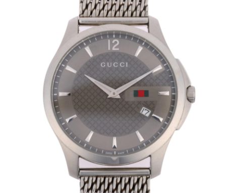 GUCCI - a stainless steel G-Timeless quartz calendar bracelet watch, ref. 126.3, grey dial with applied arrowhead hour marker