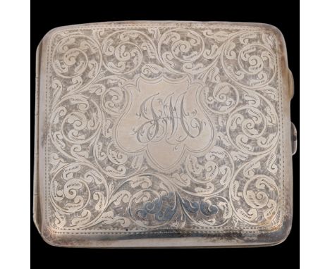A George V curved silver cigarette case, William Aitken, Birmingham 1916, square form with allover foliate engraved decoratio