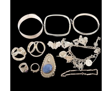 Various silver jewellery, including charm bracelet, scarf rings, christening bangle, etc, 200g gross Condition Report: Lot so