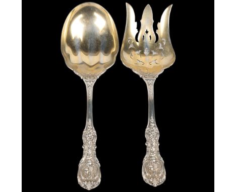 A pair of American sterling silver dessert servers, William Wise &amp; Son, relief cast fruit and acanthus leaf handles with 