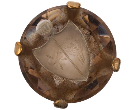 A late 20th century 9ct gold smoky quartz armorial seal ring, the round smoky quartz intaglio carved with Tudor Rose and 3 ei