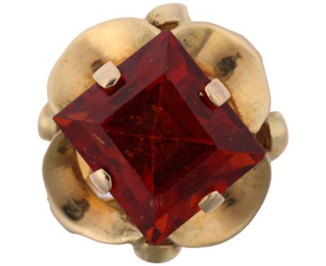 A late 20th century hessonite garnet dress ring, claw set with 9ct rectangular step-cut garnet, apparently unmarked, garnet w