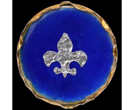 A modern enamel fleur-de-lis panel ring, apparently unmarked, setting height 21.7mm, size M, 6.6g Condition Report: No damage