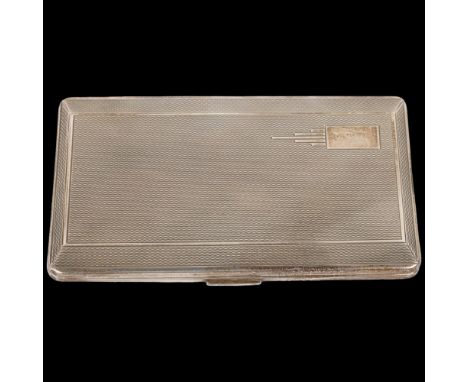 An Art Deco style George VI silver rectangular cigarette case, Harman Brothers, Birmingham 1951, allover engine turned decora