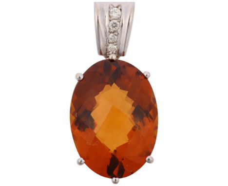 A modern 18ct white gold citrine and diamond drop pendant, set with oval rose-cut citrine and modern round brilliant-cut diam