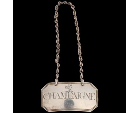A George II silver heraldic Champaigne wine label, Susanna Barker, London circa 1790 (no date letter), 5cm x 2.5cm Condition 