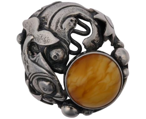 NIELS ERIK FROM - an Art Nouveau style Danish sterling silver and butterscotch amber fish openwork ring, setting height 24.4m