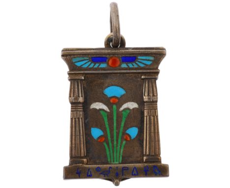 A Continental 900 silver-gilt polychrome enamel Egyptian Revival tomb photo locket pendant, with winged scarab beetle, flower