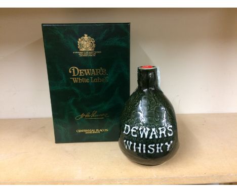 DEWAR'S WHITE LABEL CENTENNIAL FLAGON 
Blended Scotch Whisky,
Commemorating the 100th Anniversary of Dewar's winning their fi