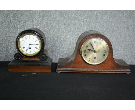 A 19th century ebonised and mahogany mantel clock along with a later clock. H.23 W.42cm. (largest) 