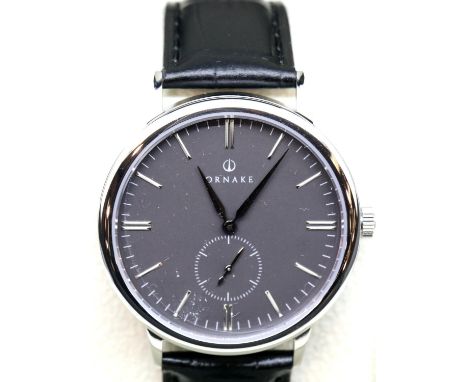 New boxed Ornake gents wristwatch with Japanese Mituyo movement and silver with black face. P&amp;P Group 2 (£18+VAT for the 