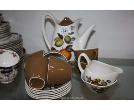 A Midwinter Coffee set including six cups, saucers, coffee pot and milk jug and sugar bowl.