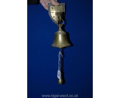 A Brass Doorbell complete with wall Bracket