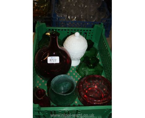 A quantity of glass including red glass bottle, cranberry coloured jug and bowl, four green candlestick holders, etc.