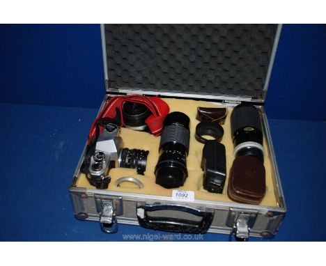 A metal case with Pentax Spotmatic, Pentax ME Super, Lenses, Light meter and Flash