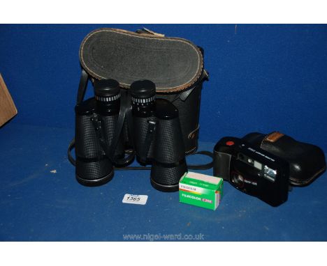 A Canon Camera and film and a pair of Pathescope Binoculars, boxed.