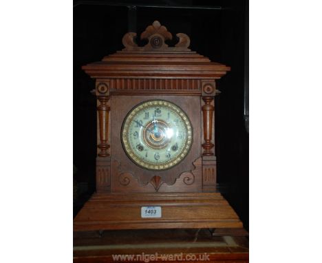 A Mantel Clock.