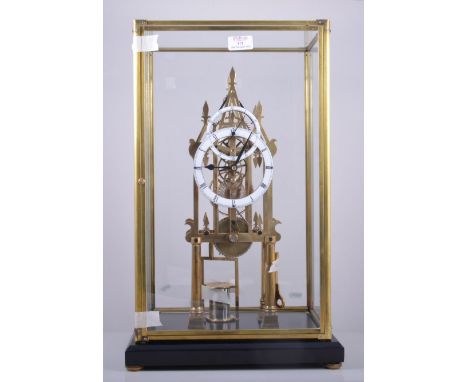 Brass skeleton clock, two intersecting dials, fusee movement, in a glazed case, 55cm overall.