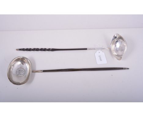 Georgian white metal toddy ladle, set with a George II shilling, 1758, twisted whale bone handle, 34cm and three others, each