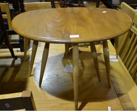 Nest of three Ercol light elm coffee tables, width 66cm and smaller.