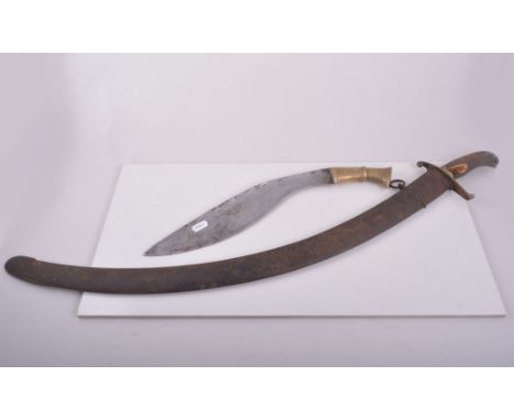 Continental sabre, curved blade, gilt metal guard with a steel scabbard, a French bayonet, a Kukri knife and a Sudanese knife