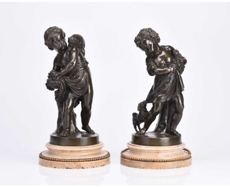 After Dumond, a pair of bronze figures of boysLate 19th century, modelled standing and wearing scant robes, one bearing a cat