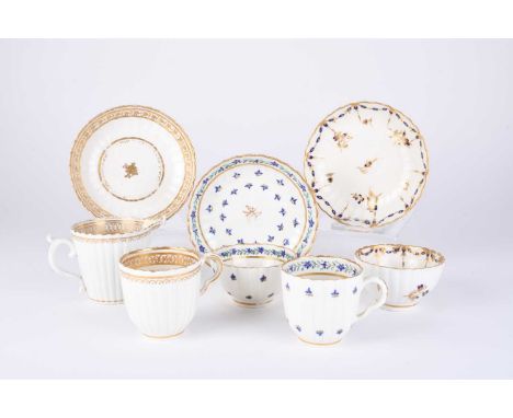 A group of Caughley porcelain, 18th century, comprising an 'Angouleme Sprigs' fluted trio of coffee cup, tea bowl and saucer,