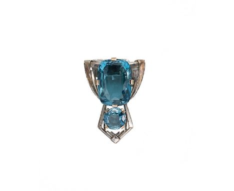 stylised geometric arrow with a claw set cushion shaped aquamarine, 21 x 15.2mm, estimated approximate weight 19.00ct, above 