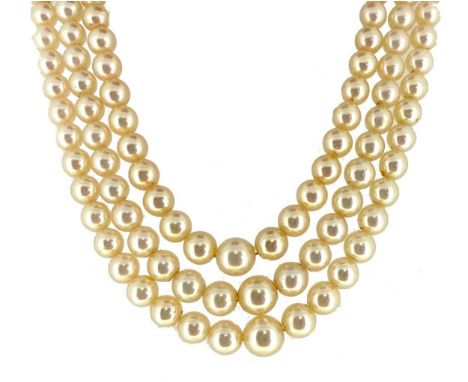 three rows of graduating light cream, slightly off-round cultured pearls, graduating from 5 to 8.7mm, strung knotted to a flo