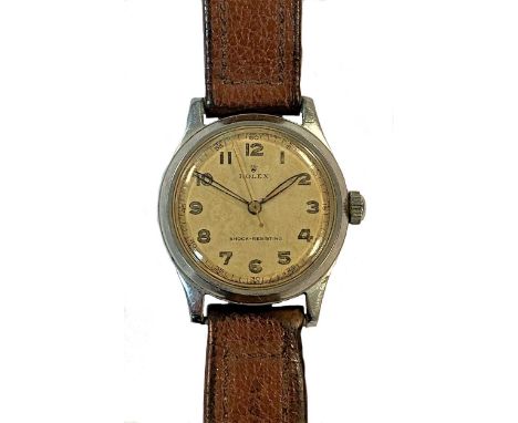 circa 1940, model 1201, the signed circular cream coloured dial, 25mm diameter, with Arabic numerals, skeleton hands, centre 