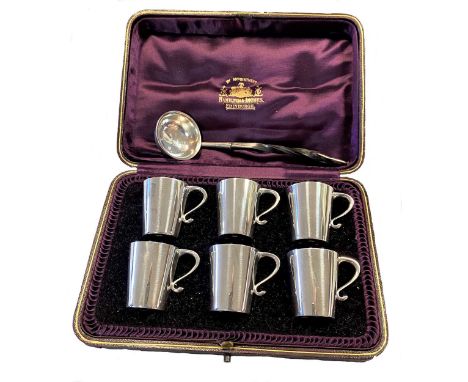 the tot cups with mark of Hamilton &amp; Inches, 1906, each of circular, tapering form with simple scroll handle, gilt washed