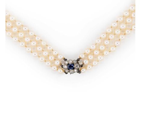 three rows of graduating light cream, slightly off-round cultured pearls, graduating from 5.5 to 9.1mm, strung knotted to a c