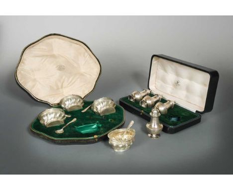 the salts with mark of Goldsmiths' &amp; Silversmiths' Co. Ltd., London 1908, each of oval, slightly baluster form, the sides