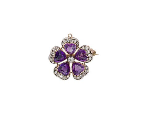 designed as a flower head, with a central rubover set old European cut diamond, diameter 2.4mm, within a surround of five pet