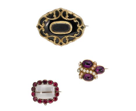 first, a Georgian rectangular brooch with a central vacant glazed compartment surrounded by fourteen foil backed oval faceted